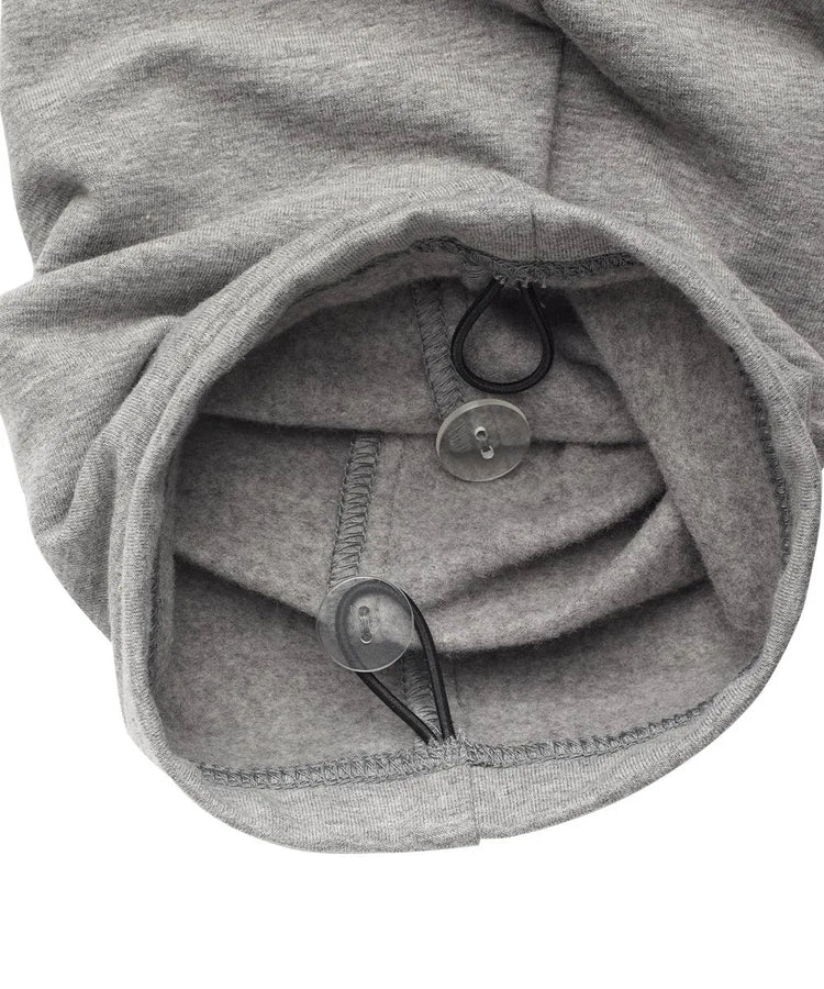 June Adaptive Men's Open Back Fleece Pants in grey, detailed view showing the elasticized waist and adaptive features
