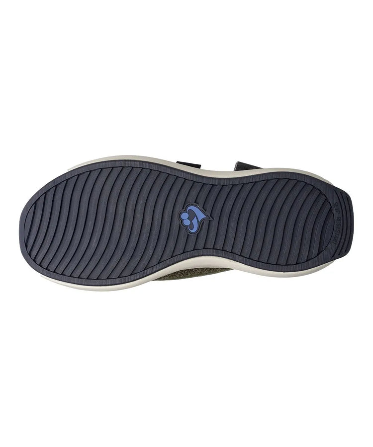 heel pull tab on men's extra-wide adaptive shoes, facilitating easy wearing with a comfortable, cushioned heel design