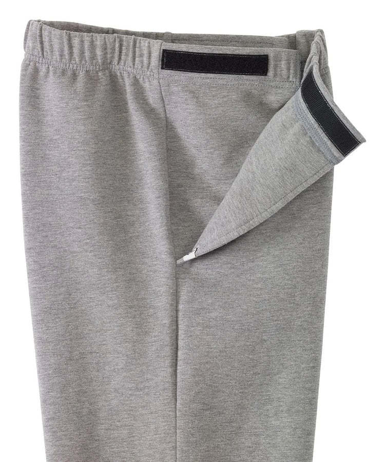 Close-up of the side closure mechanism on June Adaptive Men's Fleece Pants in Gray, highlighting Velcro straps for accessibility