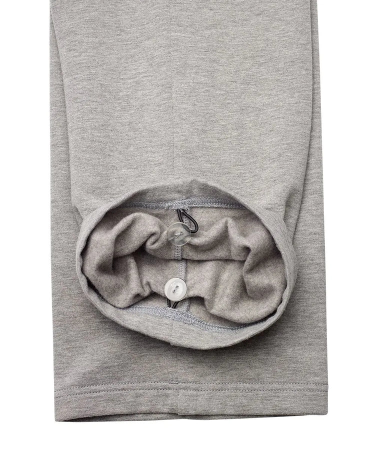 Detailed image showing the texture and functionality of the June Adaptive Men’s Gray Fleece Pants with side closures.