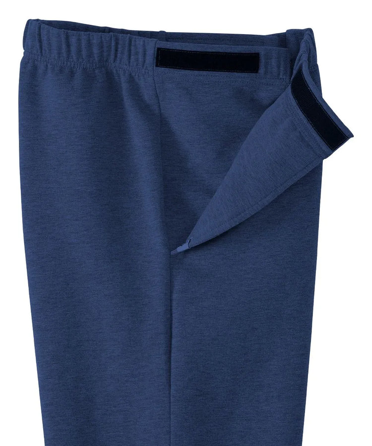 Close-up of the side closure mechanism on June Adaptive Men's Fleece Pants in Navy, highlighting Velcro straps for accessibility.