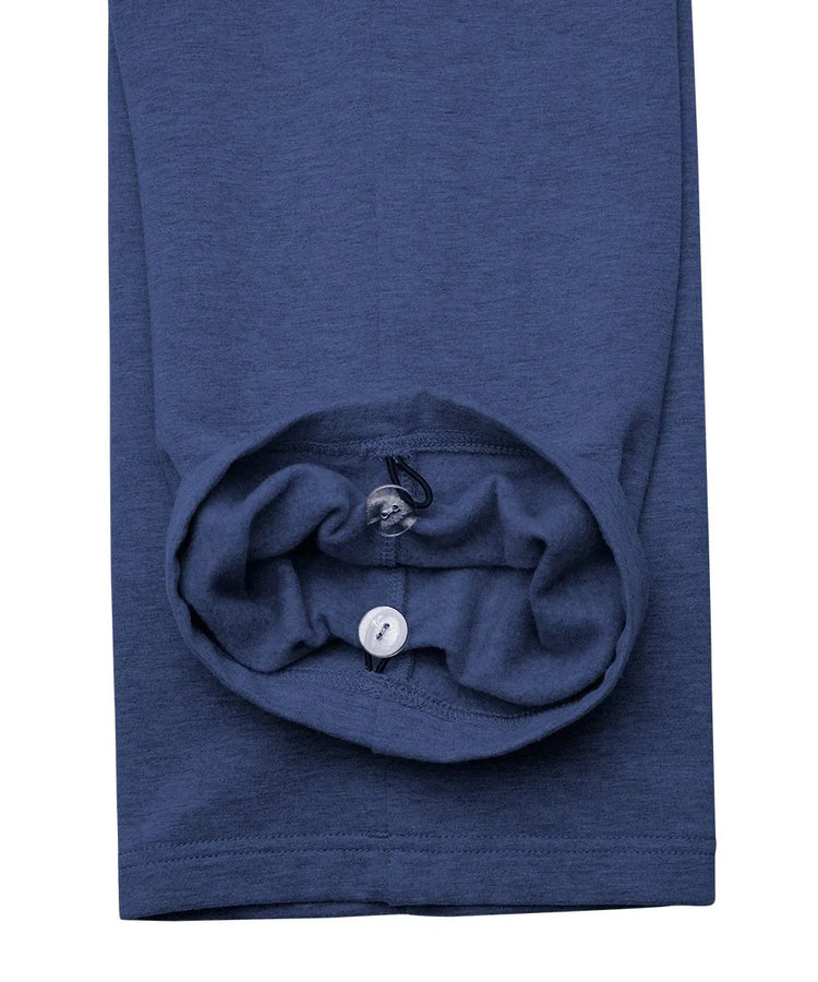Detailed image of the cuff of June Adaptive Men's Easy Touch Side Closure Fleece Pants in Navy, highlighting the internal elastic mechanism with a toggle for easy adjustability.