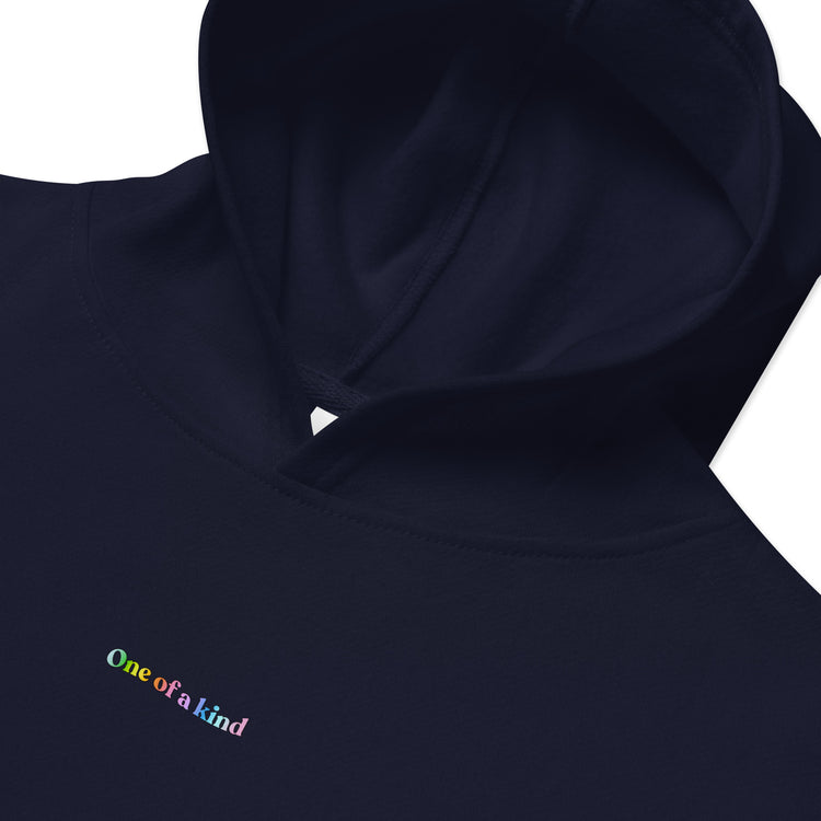 Closeup of Indigo Kidswear Hoodie featuring "One of a kind" printed on front.