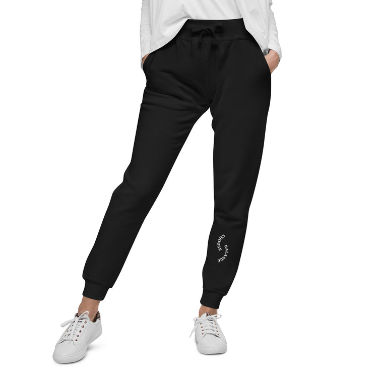Closeup of Black Sweat pant with "Choose Balance" printed on left lower leg.