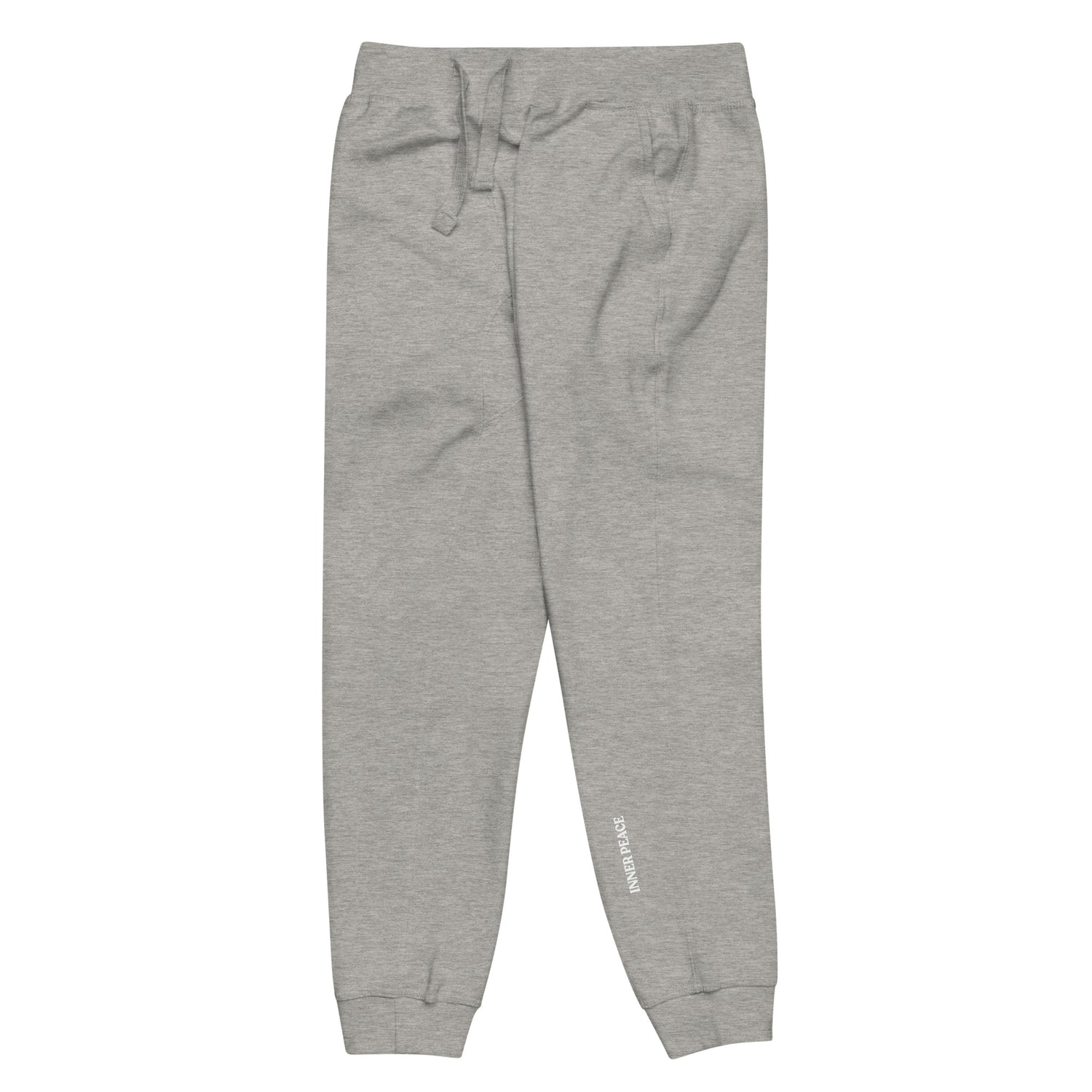 Side of grey sweat pant featuring " Inner peace' printed on left lower leg.