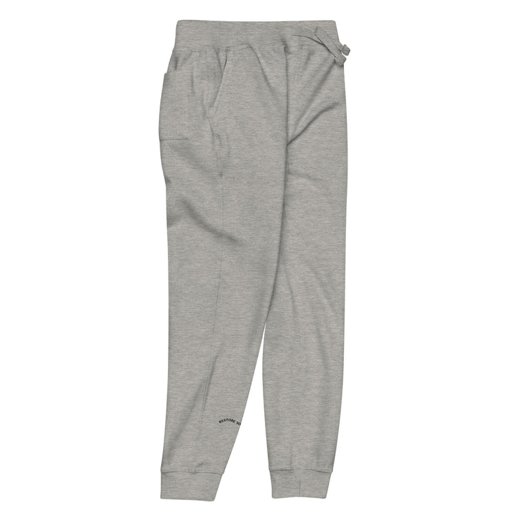 Side of full length grey sweat pant with pockets on side and back, featuring "restore yourself" printed on right side lower leg.