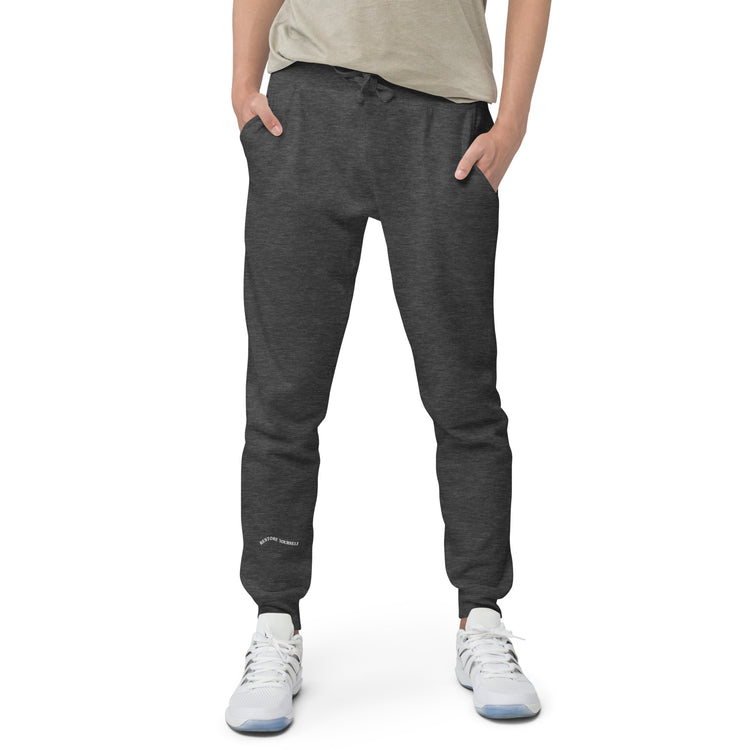 Closeup of Charcoal Sweat pant with "Restore Yourself" printed on right lower leg.