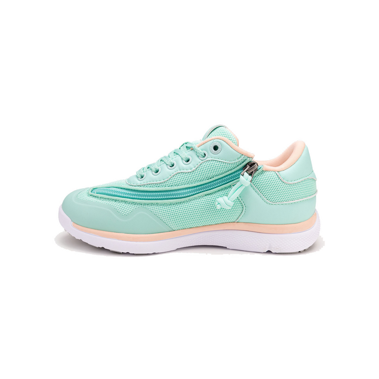 Mint women's shoe with white bottom, peach accents, and rear zipper access.