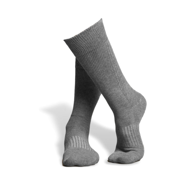 Grey anti slip calf height socks with seamless toe design.