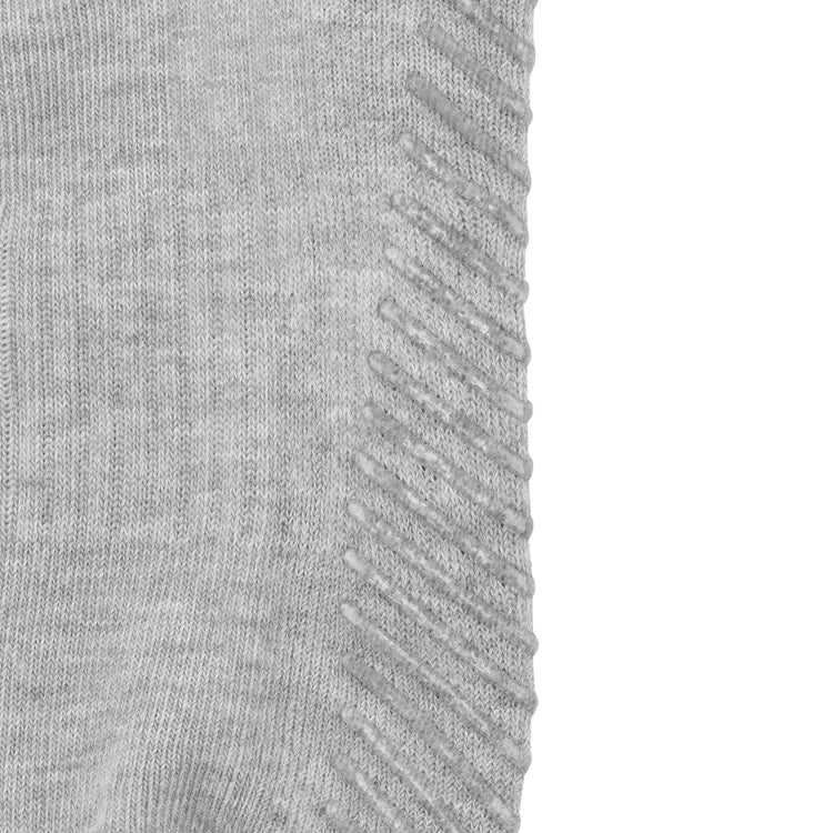 Close up of grey anti slip calf height socks with seamless toe design.