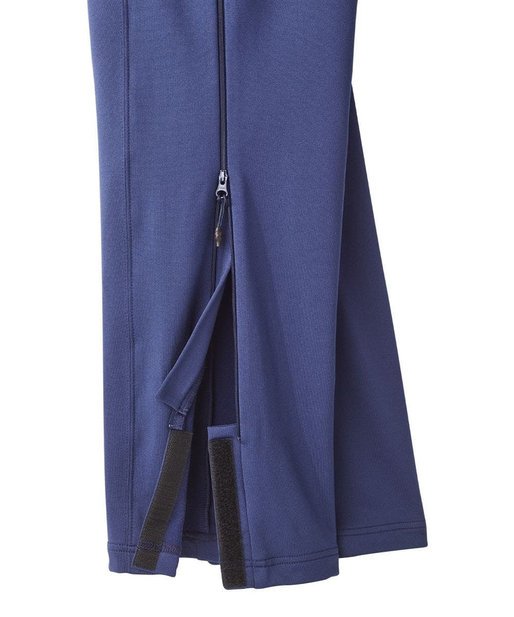 Blue pants with zippers on the pocket and side, with elastic waist. Velcro on ankle.