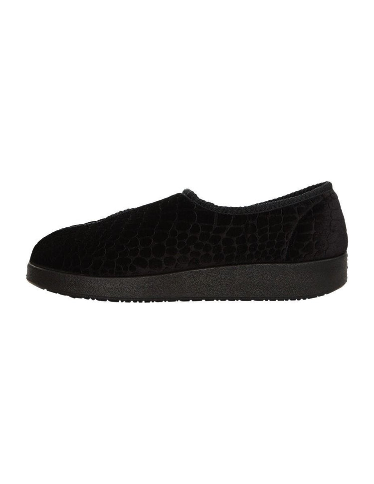 Side of the wide black indoor slippers, with small curvy shapes all over the slipper