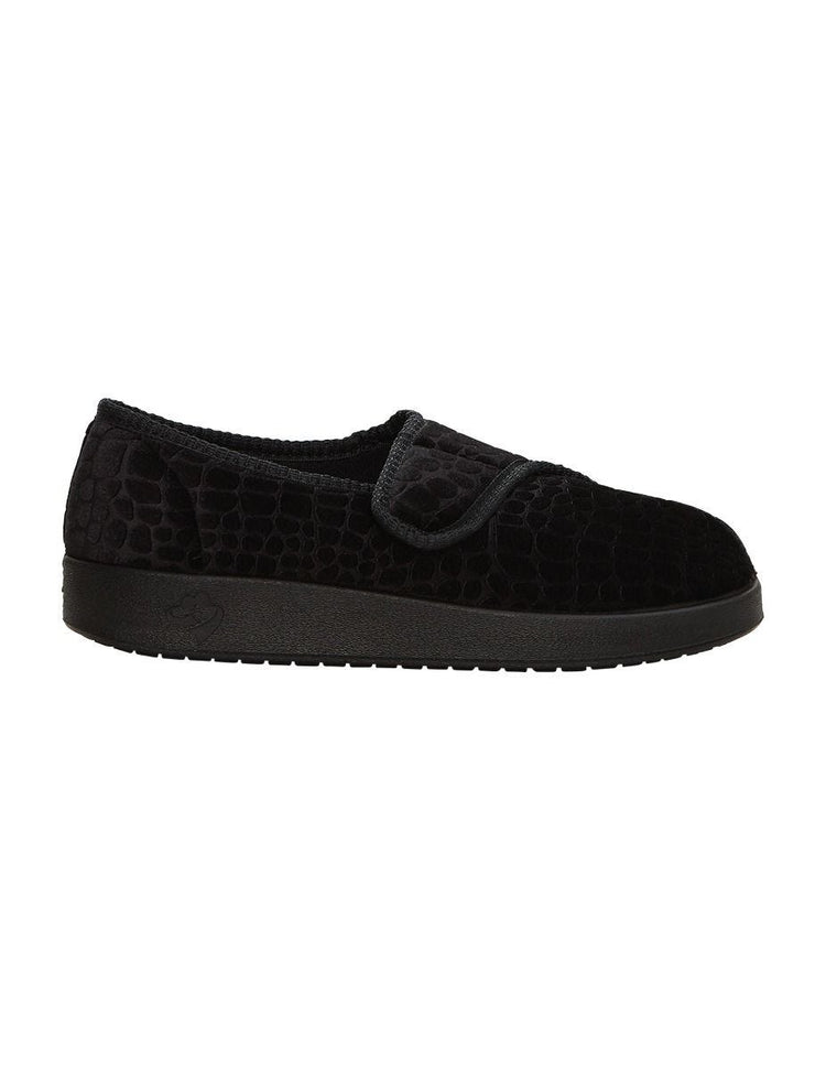 Side of the wide black indoor slippers, they open up completely with large Velcro closures
