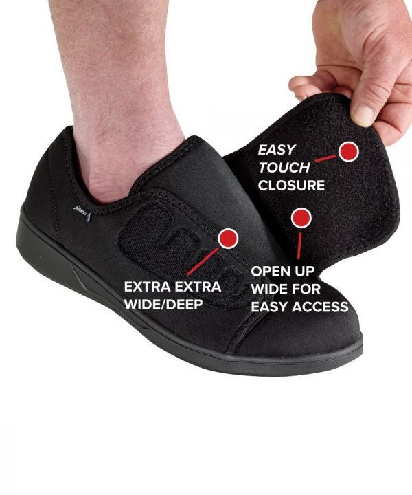 Extra wide flexible black shoe featuring huge easy touch Velcro closure and removable insoles