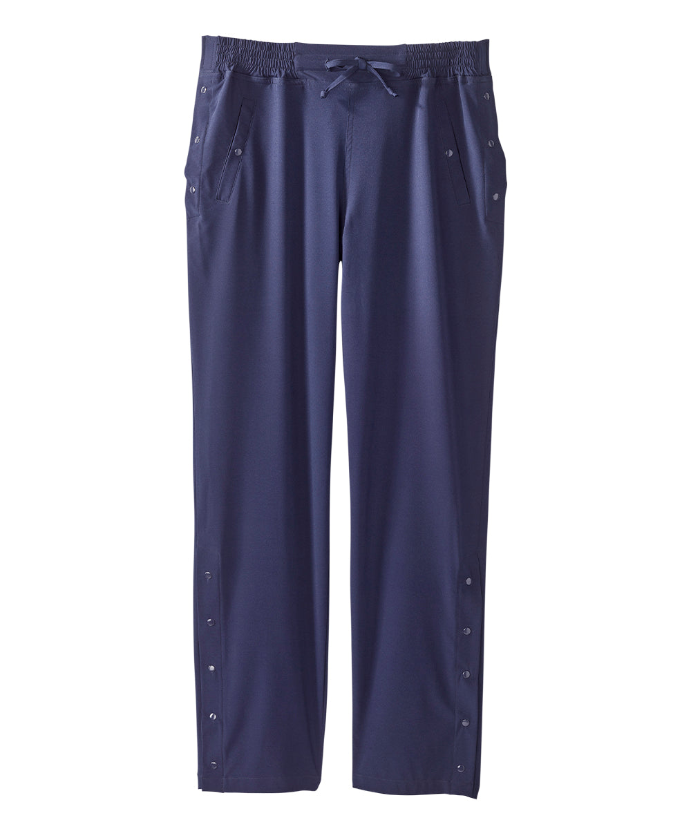 Women’s navy blue leisure pants with snaps along the waist and leg openings.