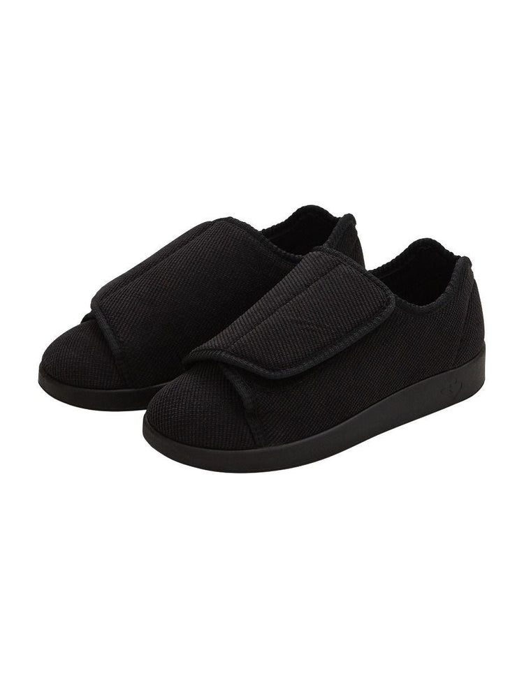 Women’s black wide non slip slippers with large velcro closure for an adjustable fit.
