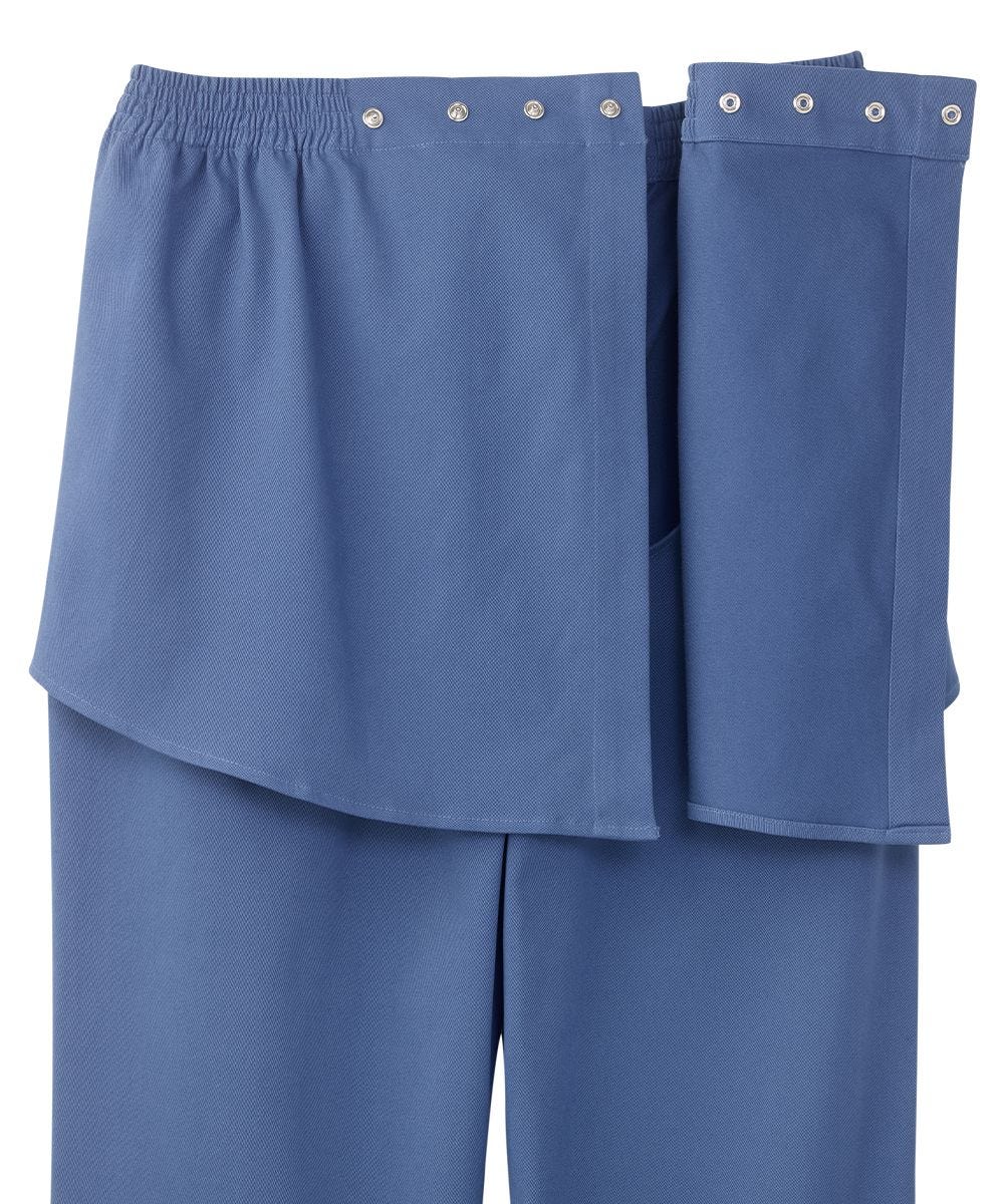 Open back of blue pants secured by snap closures at edge of waistband
