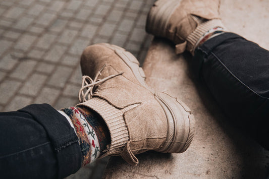 Camel boots on a ledge