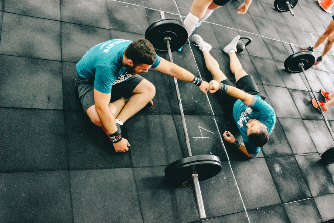 Two men working out at the gym