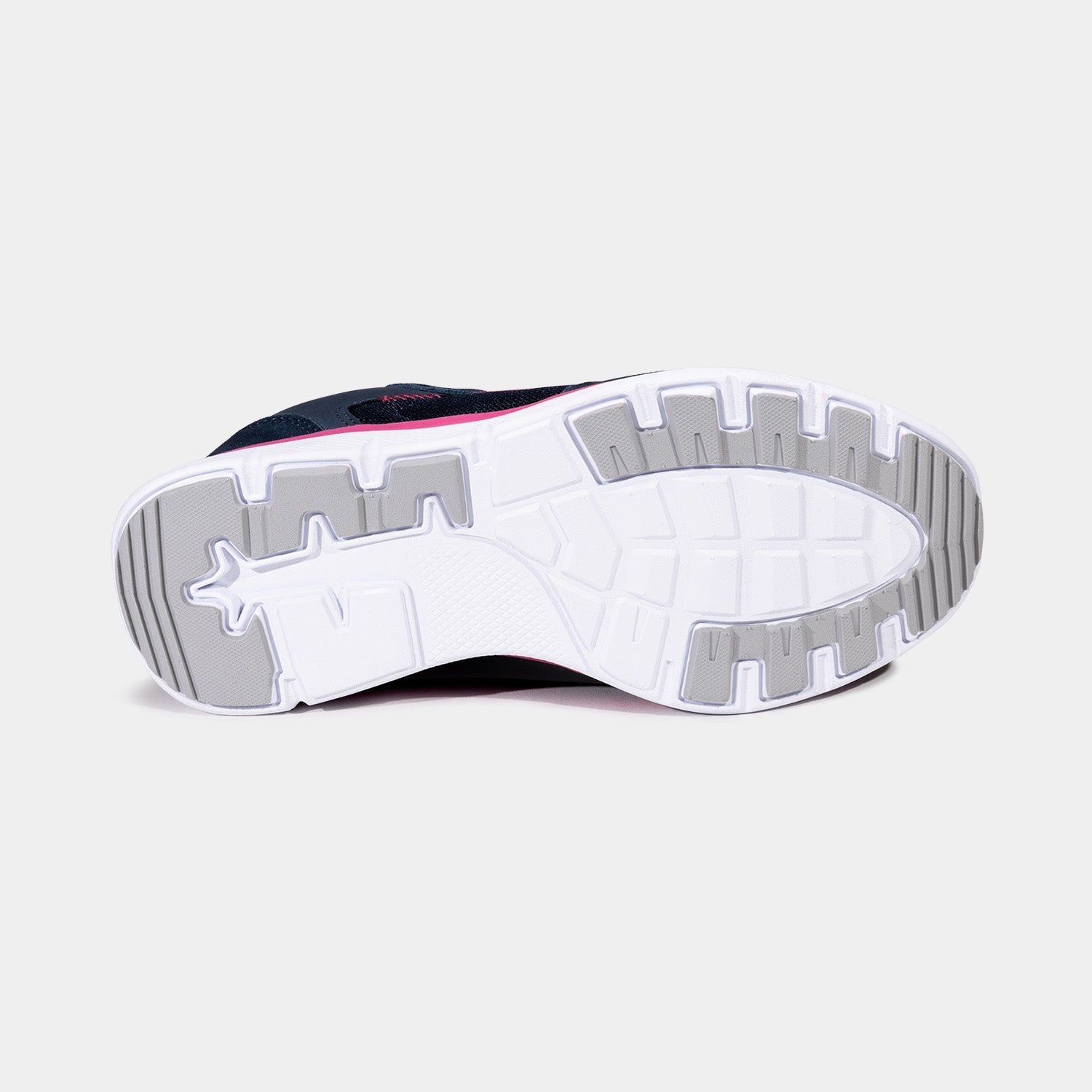 Bottom of navy women's shoe with white anti slip soles and traction patterns.