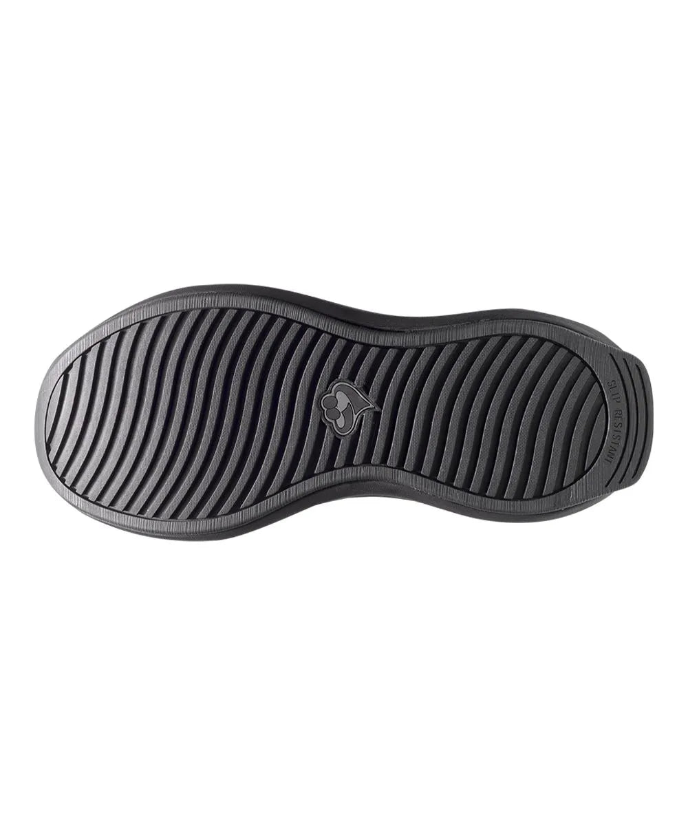 Bottom view of June Adaptive Women's Extra Wide Comfort Adjustable Shoes in Black Speckle, featuring the slip-resistant sole for added safety.