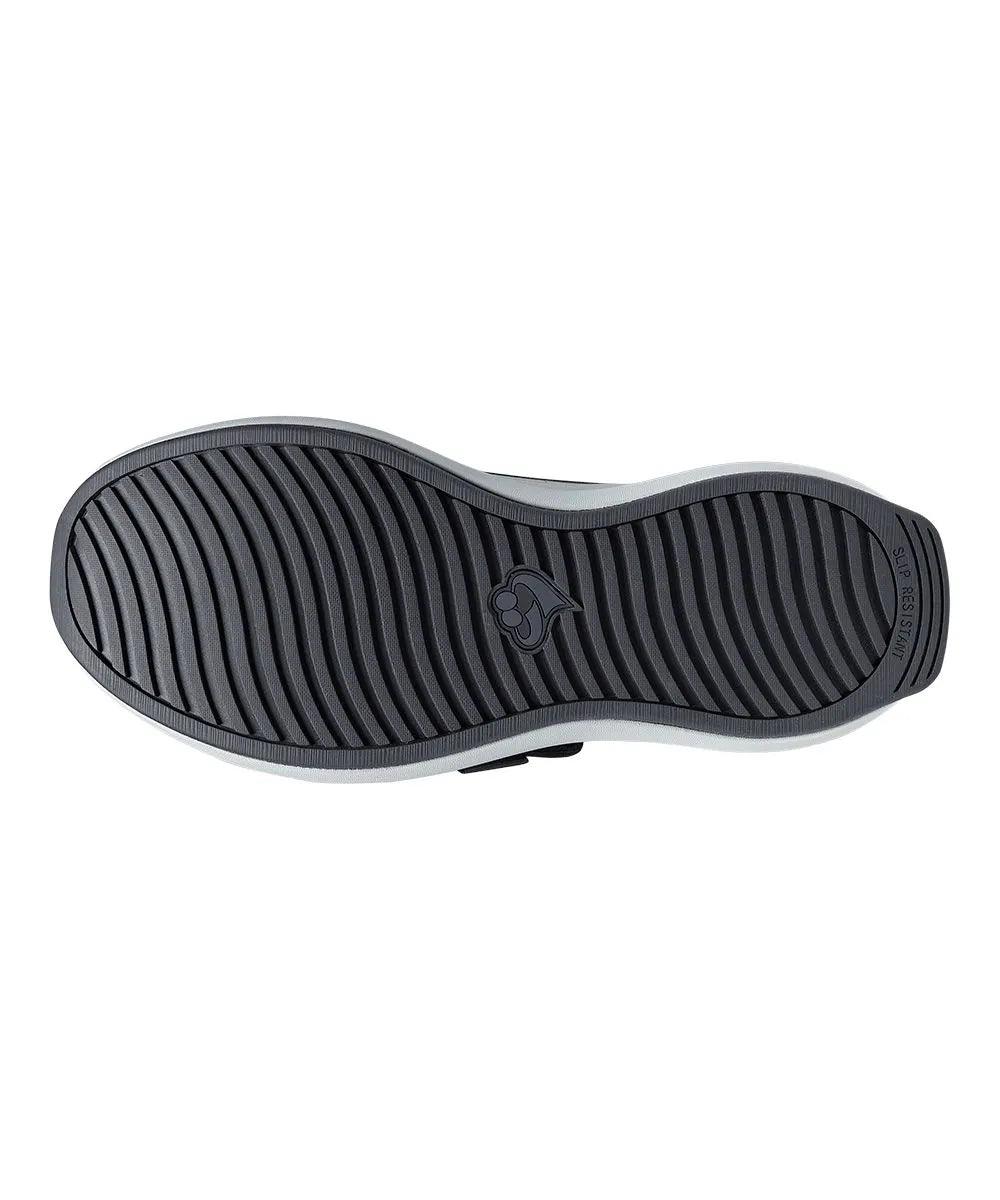 Durable, slip-resistant sole of men's extra-wide comfort shoes, designed for stability and safe walking on various surfaces