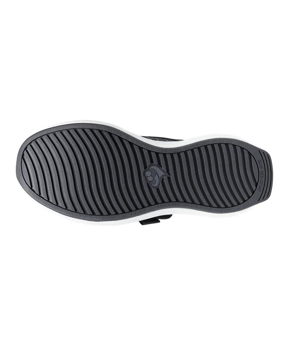 Durable, slip-resistant sole of men's extra-wide comfort shoes, designed for stability and safe walking on various surfaces