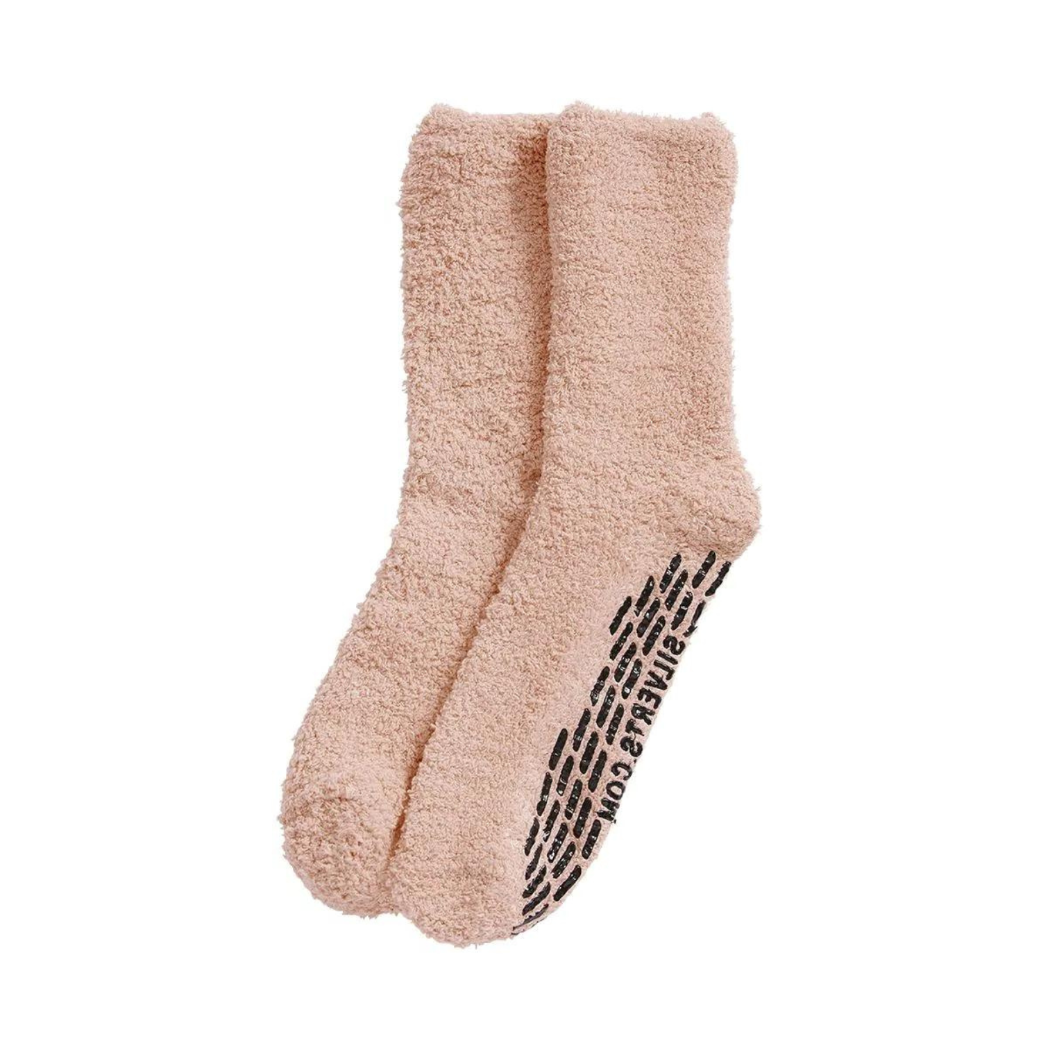 Soft salmon-colored fuzzy socks, positioned to show the texture and non-slip grips on the soles