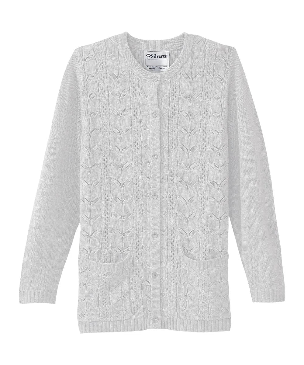Front perspective of June Adaptive Women's Cardigan in White with a buttoned front and knit patterns.