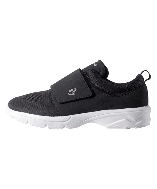 Black lightweight walking shoes with large Velcro closure at top and white slip resistant soles