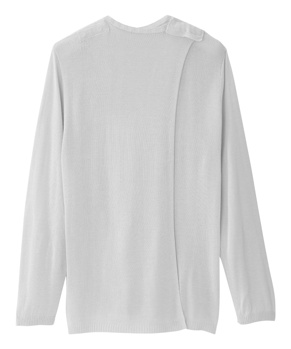 White knit cardigan with open back and snap closures at shoulders