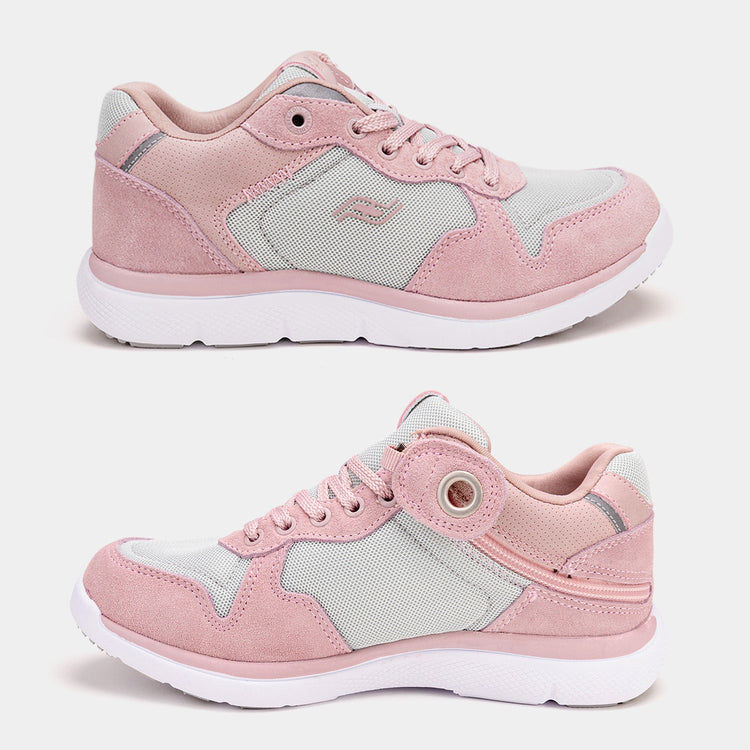 Light pink womens shoe with white bottom, light grey accents, and rear zipper access.