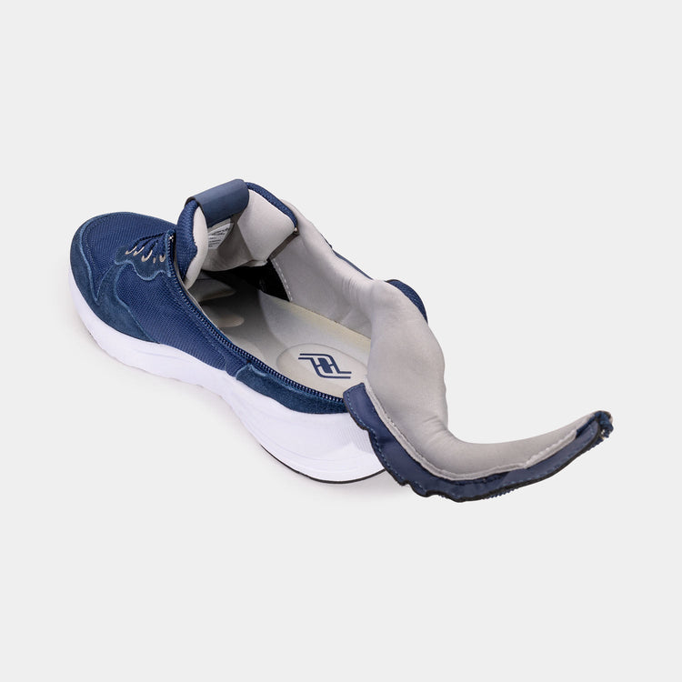 Navy blue mens shoe with unzipped rear zipper access and light grey interior.