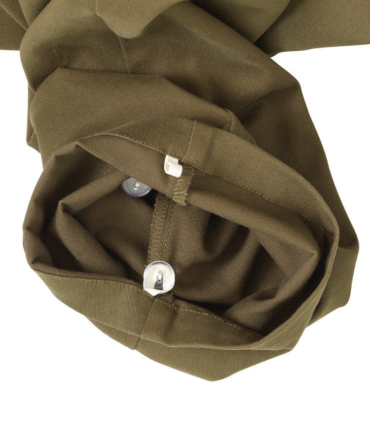 Bottom of olive pants feature inner grip loops to adjust hem of pants