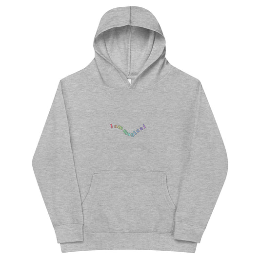 Grey Kidswear hoodie featuring "I am magical" design with pockets at front.