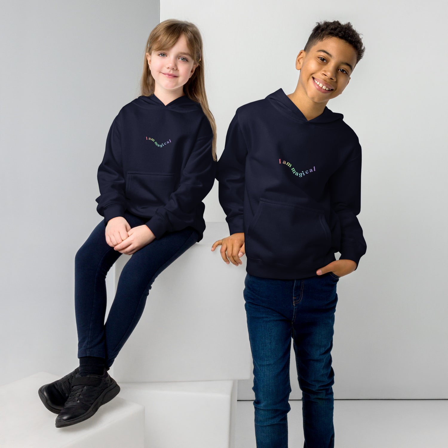 Indigo Kidswear hoodie featuring "Iam magical" design .