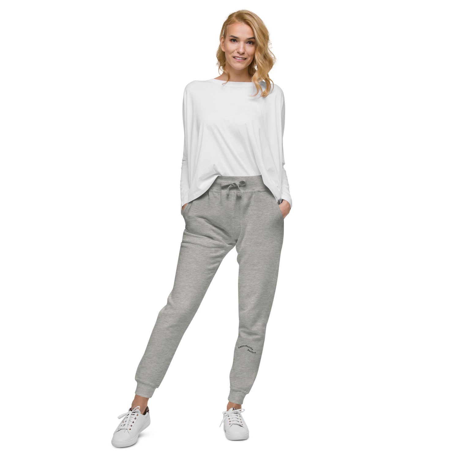 Grey sweat pant featuring "Imperfectly perfect" printed on left lower leg.