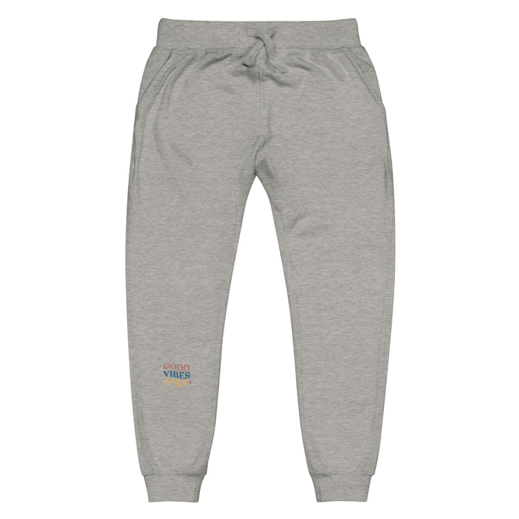 Grey sweatpant spreading "Good vibes Only" energy.