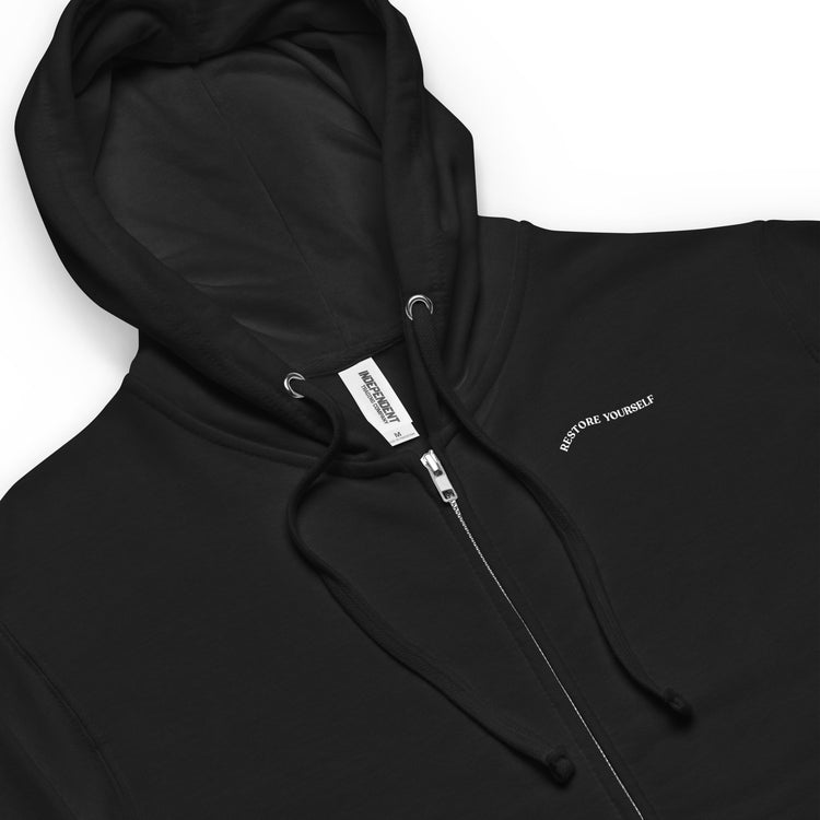 Close-up of a black zip-up hoodie featuring the empowering message "RESTORE YOURSELF" for mental health.