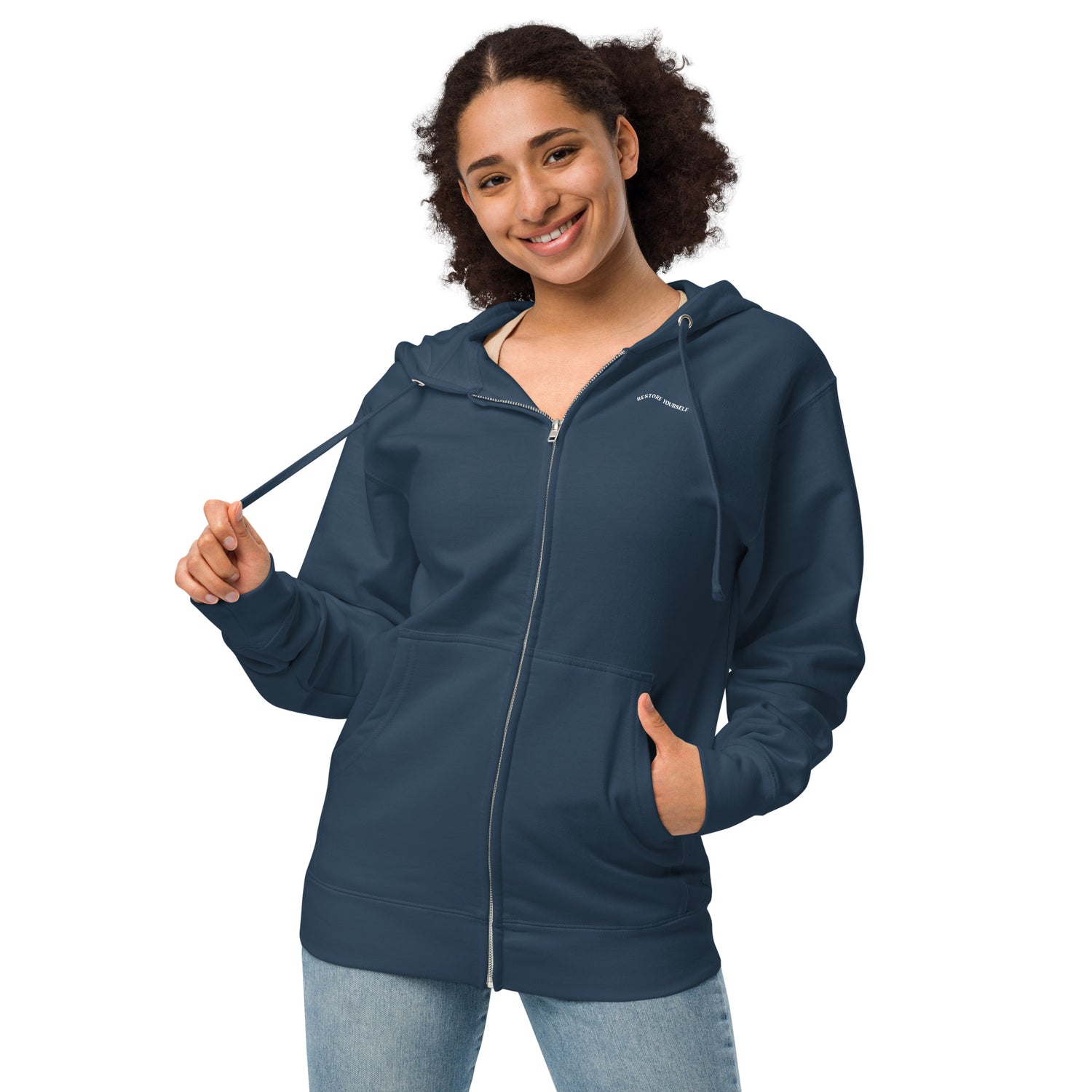 A woman wearing a Navy zip up hoodie with a "RESTORE YOURSELF" printed on chest.