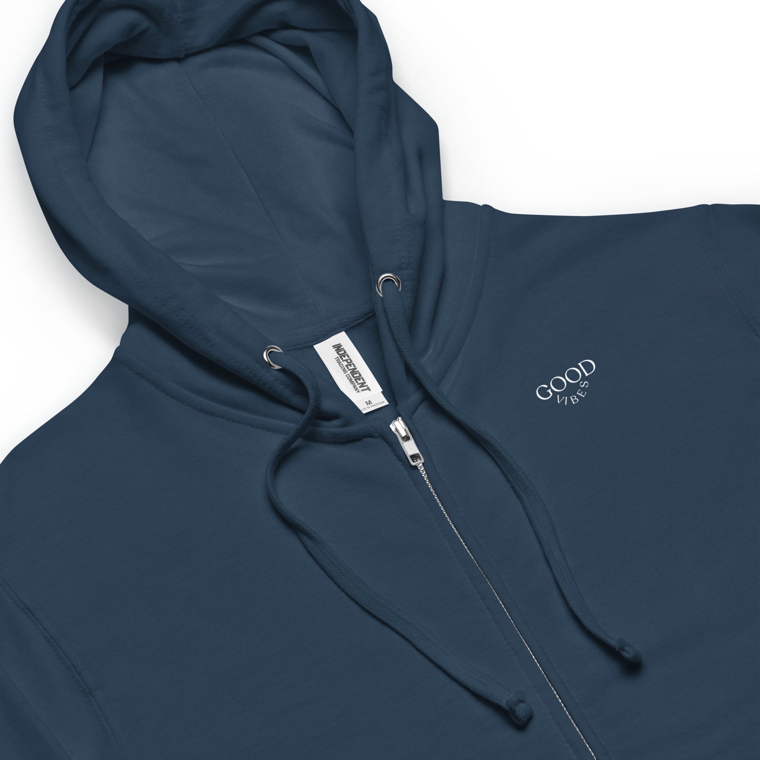 Close-up of a Navy zip-up hoodie featuring the empowering message "Good vibes" for mental health.
