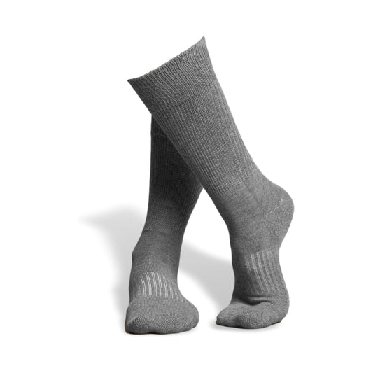 Grey anti slip calf height socks with seamless toe design.