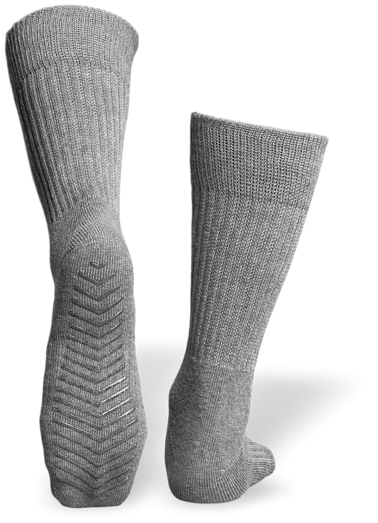 Grey anti slip calf height socks with seamless toe design.