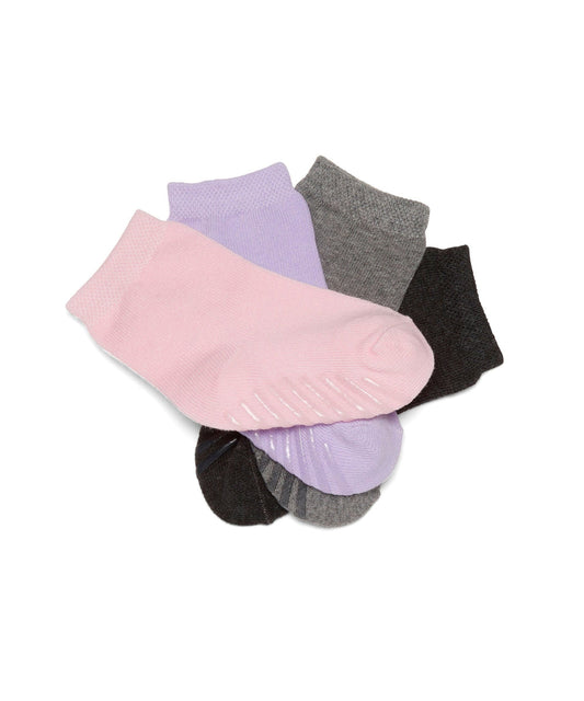Light pink, light purple, light grey, and black anti slip kids socks with tread pattern.