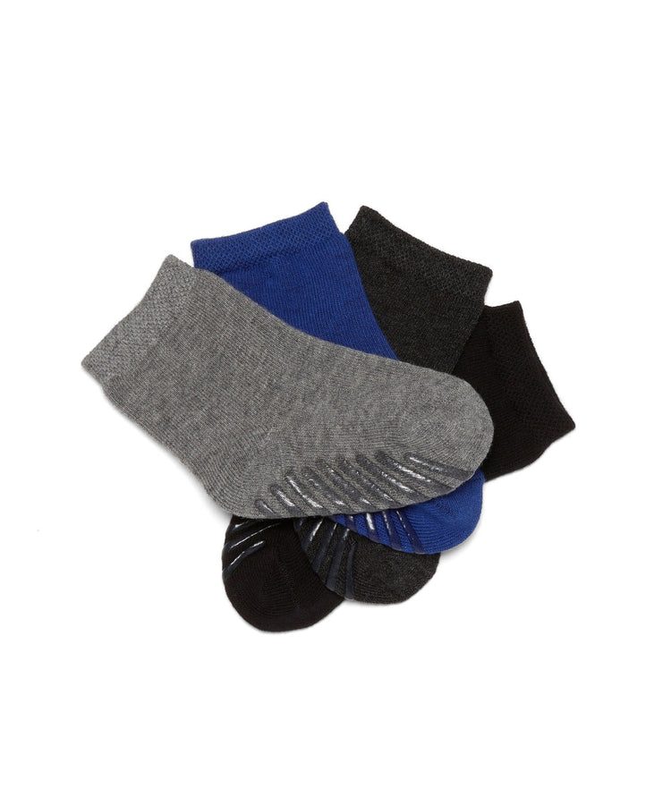 Light grey, royal blue, dark grey, and black anti slip kids socks.