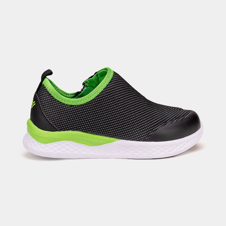 Black kids shoe with white bottom, green accents, and side zipper access.