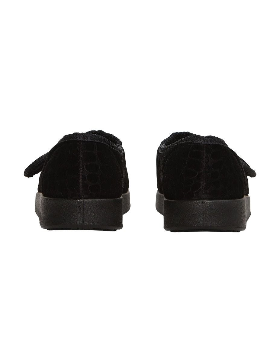 Back of the comfortable extra wide black indoor slippers with non-slip black soles