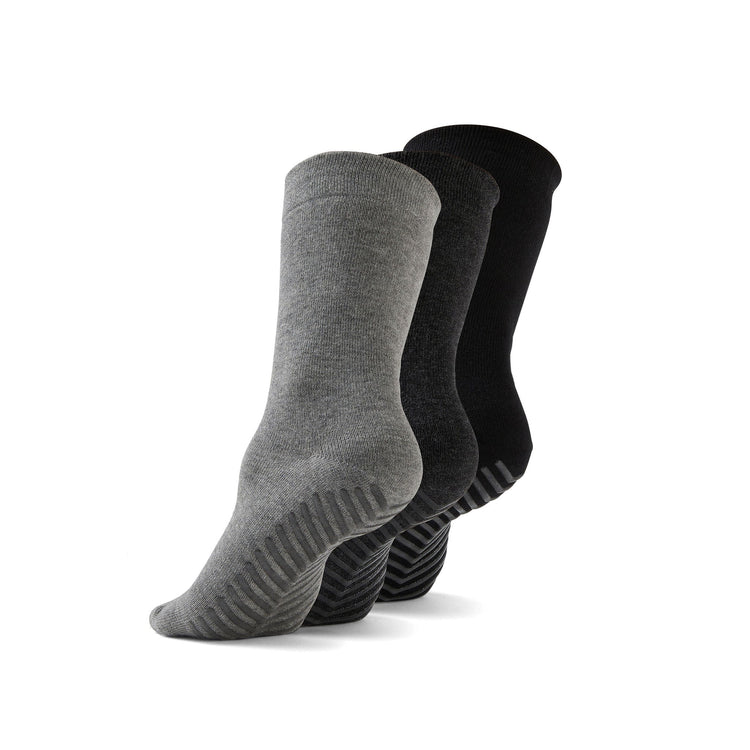 Light grey, dark grey, and black anti slip socks that sit just below the calf.