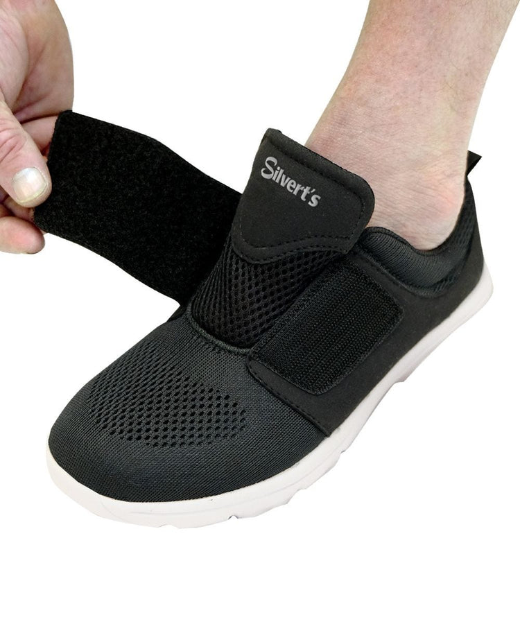 Black lightweight shoes with large Velcro closure open at top for adjustable fit