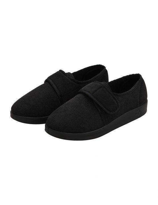 Wide soft black indoor slippers with large Velcro closure at front and black soles